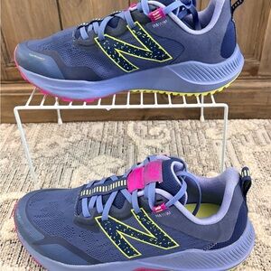 New Balance women’s Sneakers in Blue and Neon Yellow